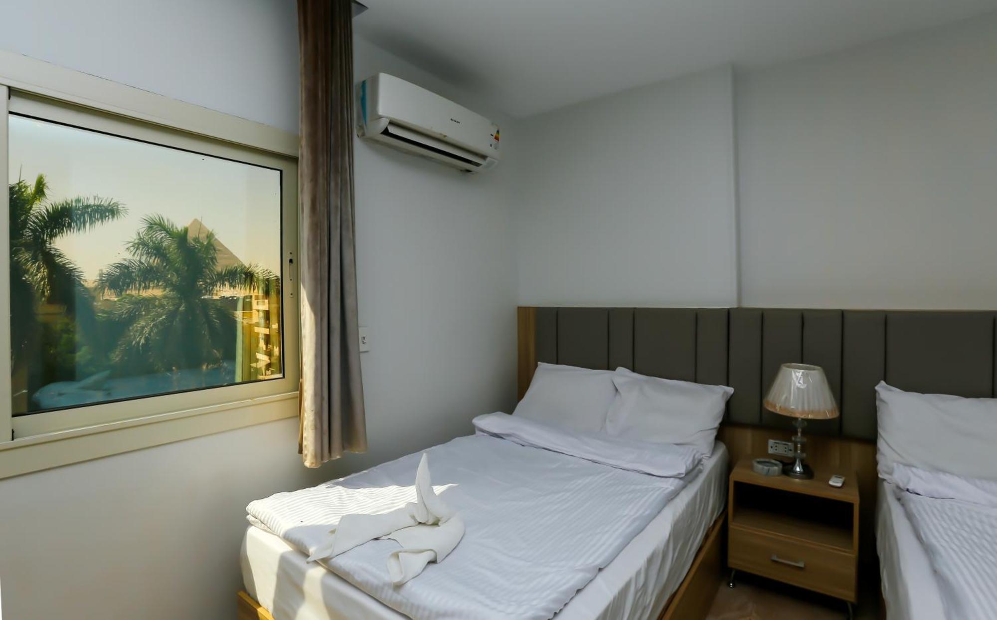 Pyramids Express View Hotel Kafret el-Gabal Exterior foto